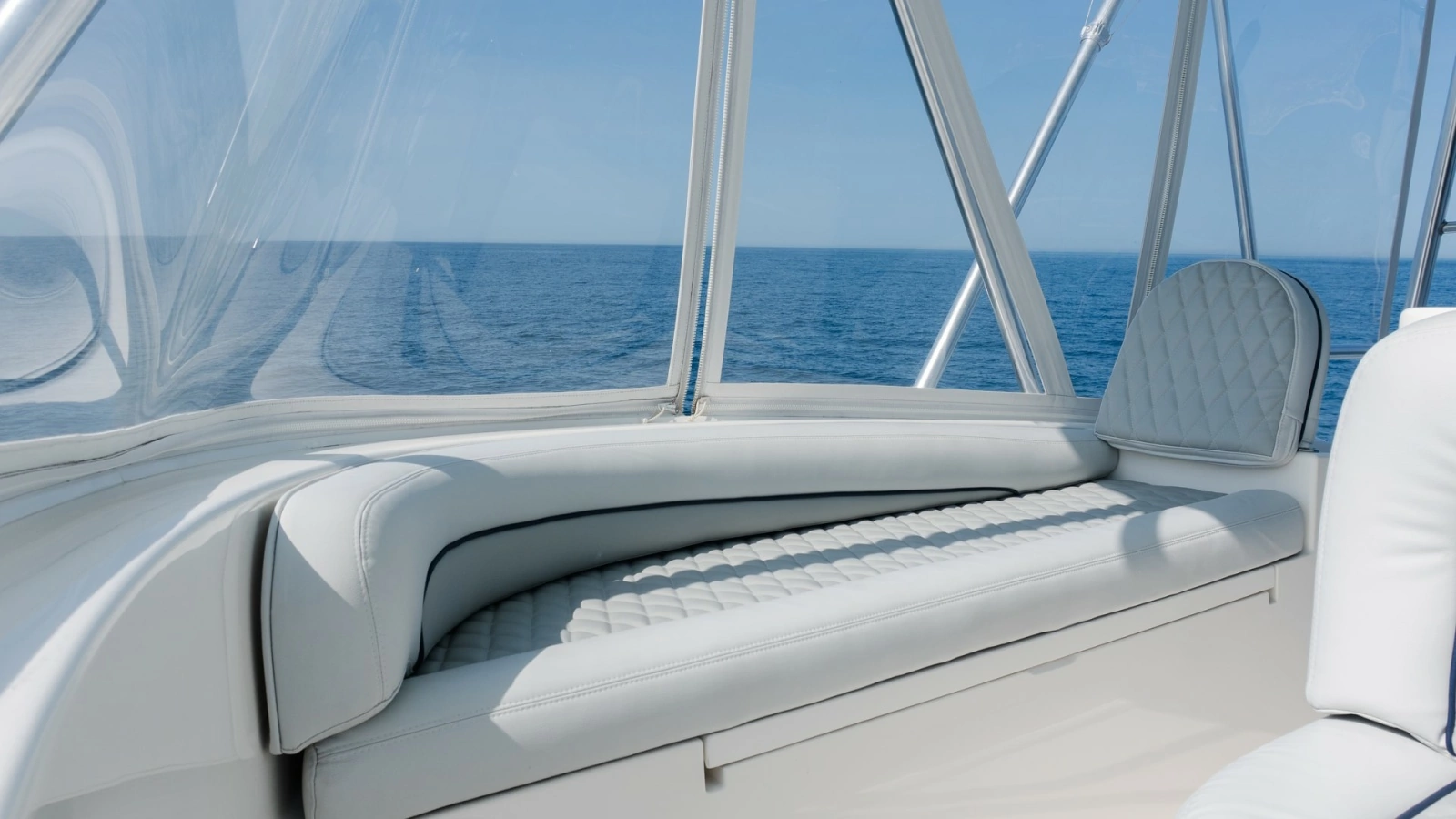 2009 Viking 50 Convertible "Jammin" - A Beautifully Appointed Flybridge Lounge Offering the Perfect Blend of Comfort, Open-Air Living, and Panoramic Views for Unforgettable Moments Underway or at Anchor.