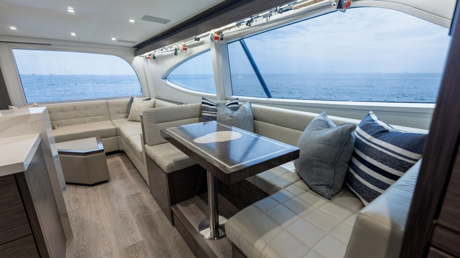 2021 65 Hatteras GT On the DL Dinette (1)