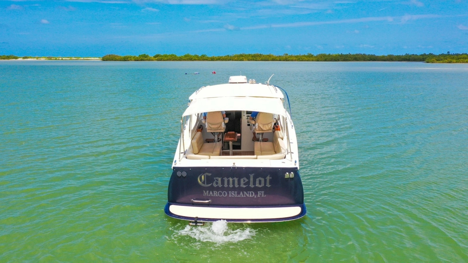 Aft View of Camelot on Water