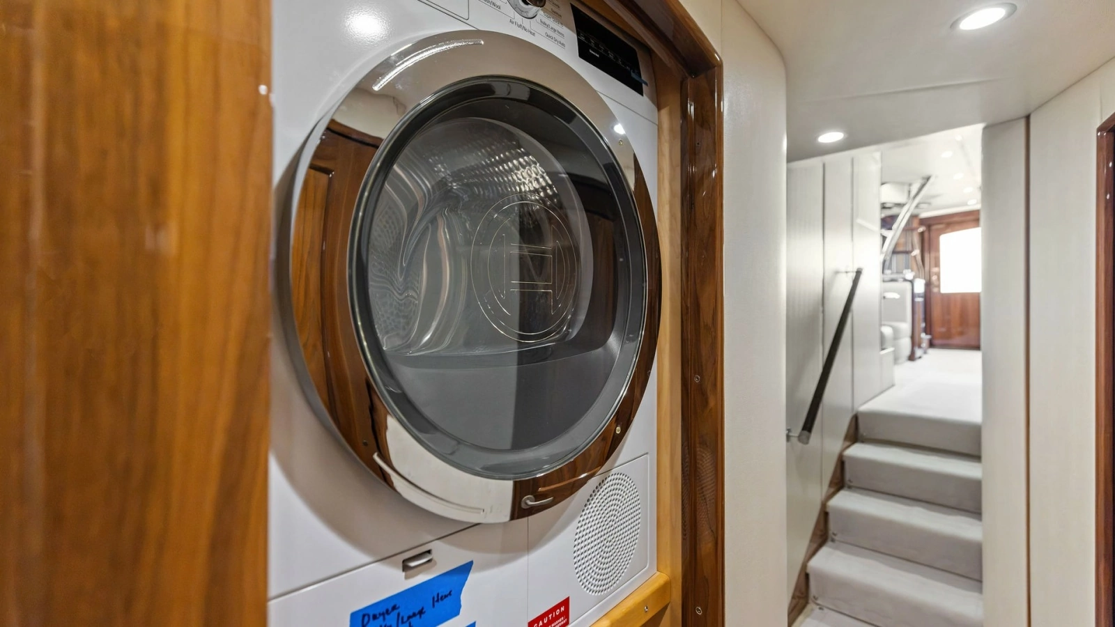 Hallway Laundry Area with Dryer