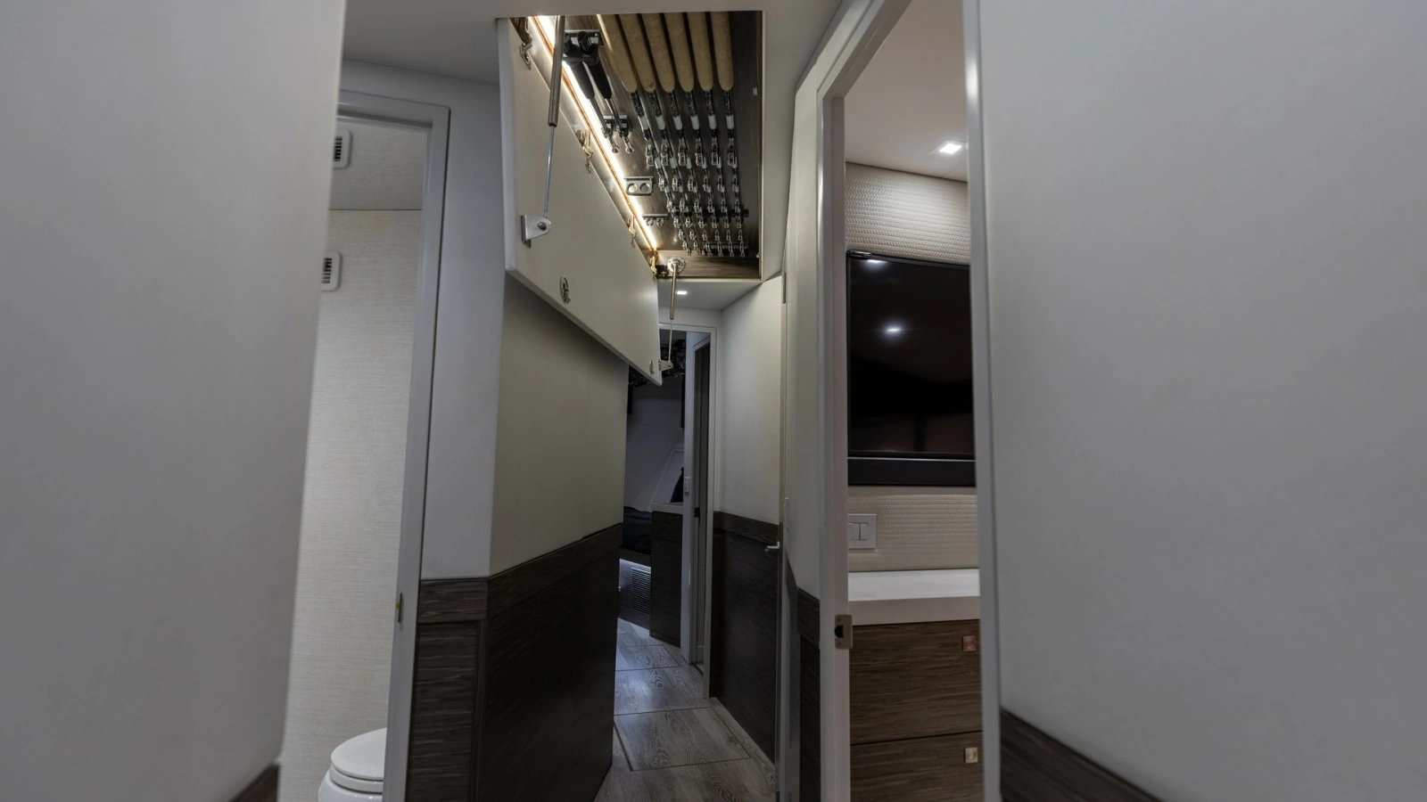 2021 65 Hatteras GT On the DL Companionway with Concealed overhead Rod Storage