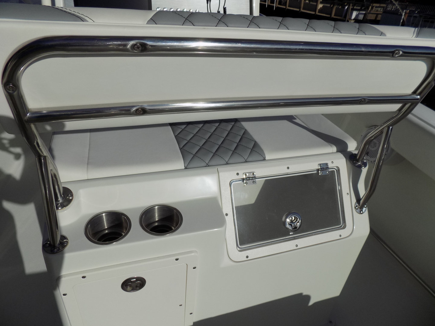 2017 Sailfish 2360 CC - Helm Chair Storage