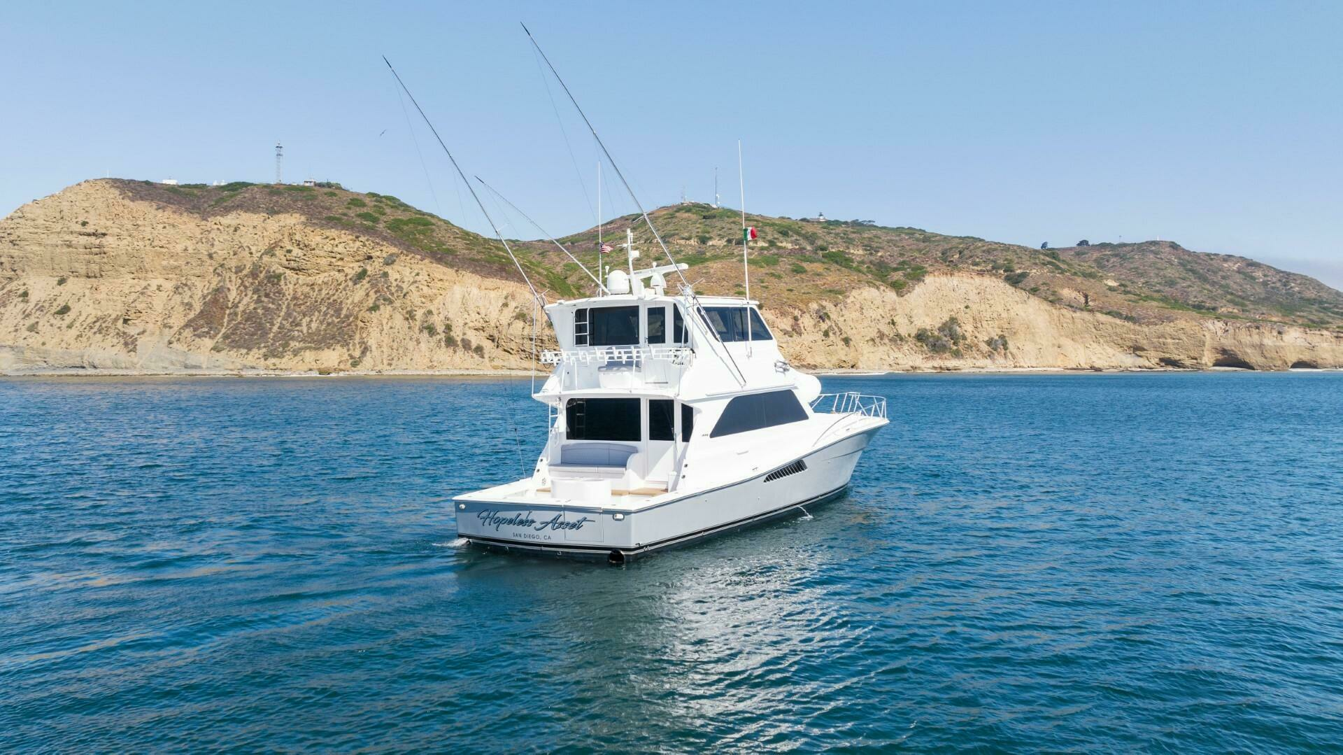 HOPELESS ASSET 2001 Viking 58 Enclosed Bridge 58 ft Convertible