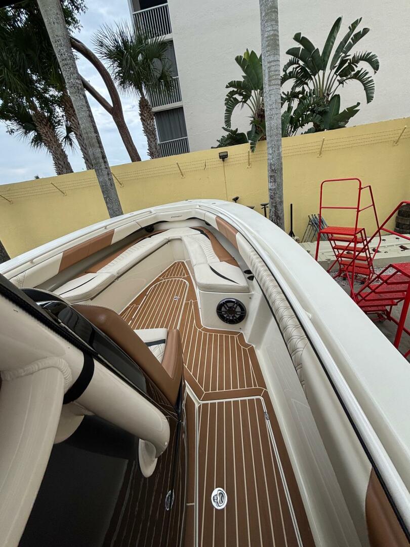 2013 Statement 35 Center Console boat with sleek deck and se