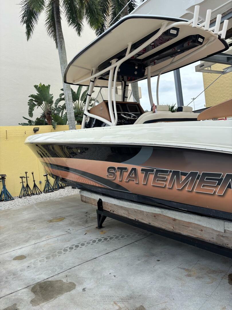 2013 Statement 35 Center Console boat on display, featuring 
