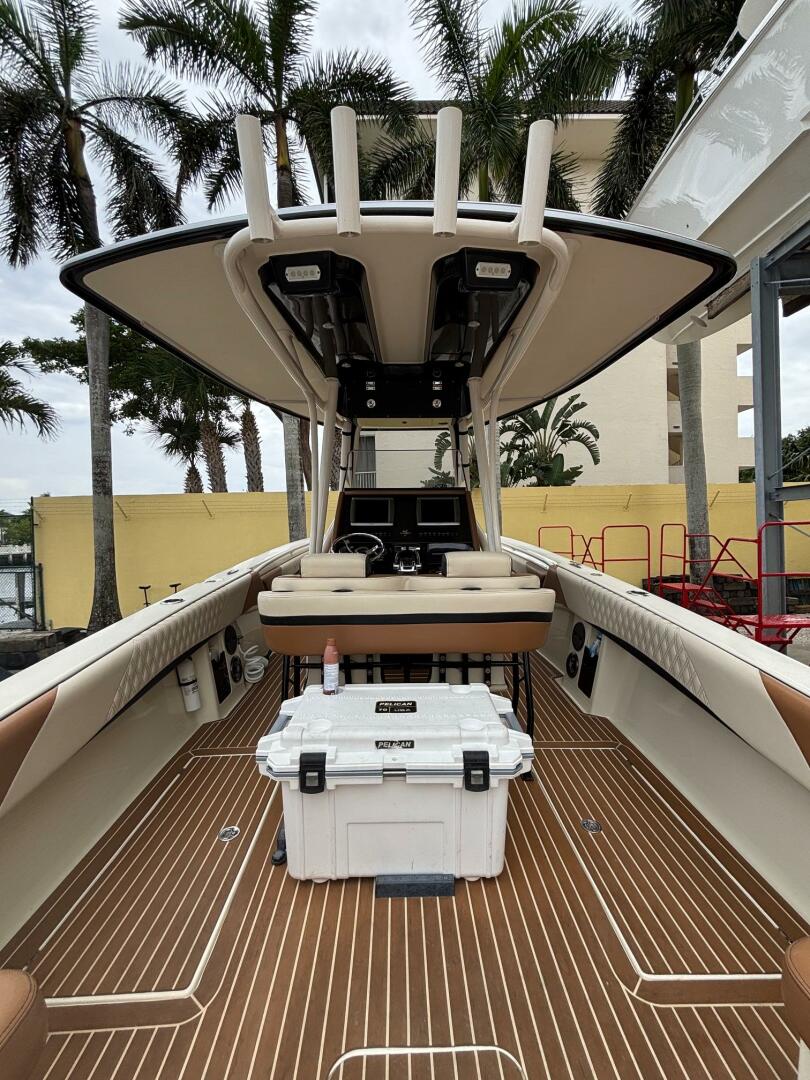 2013 Statement 35 Center Console boat with teak flooring and