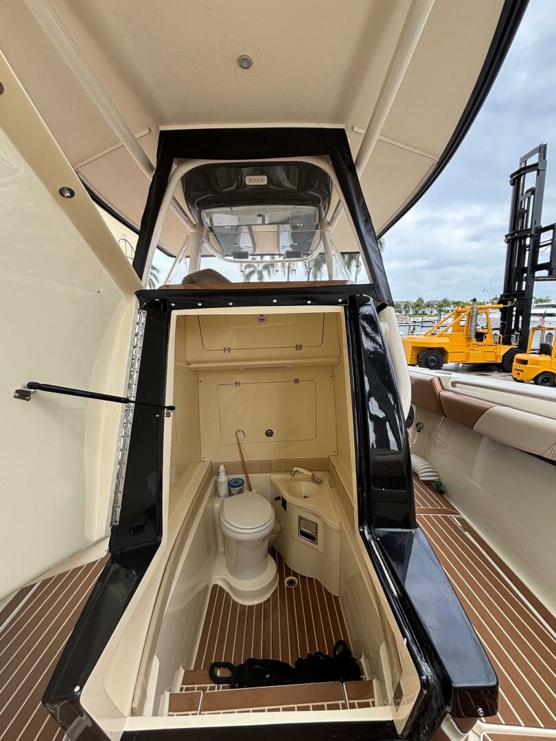 2013 Statement 35 Center Console boat interior with toilet a