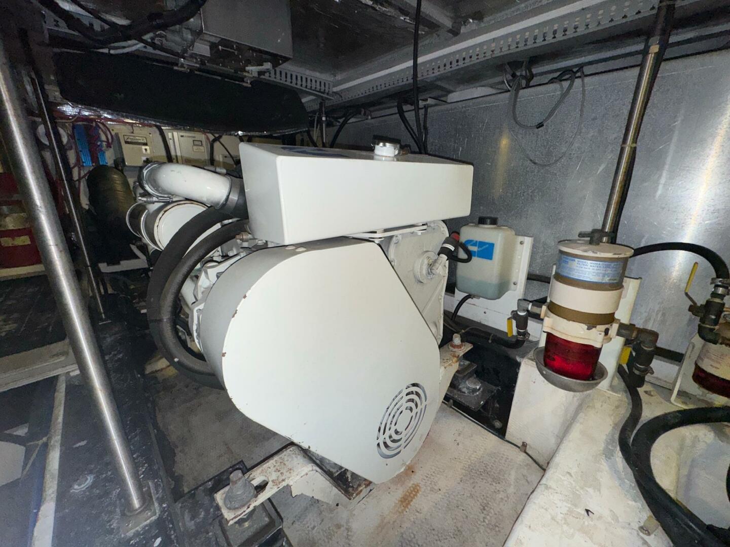 Engine room of 2000 Carver 506 Motor Yacht, showcasing machi