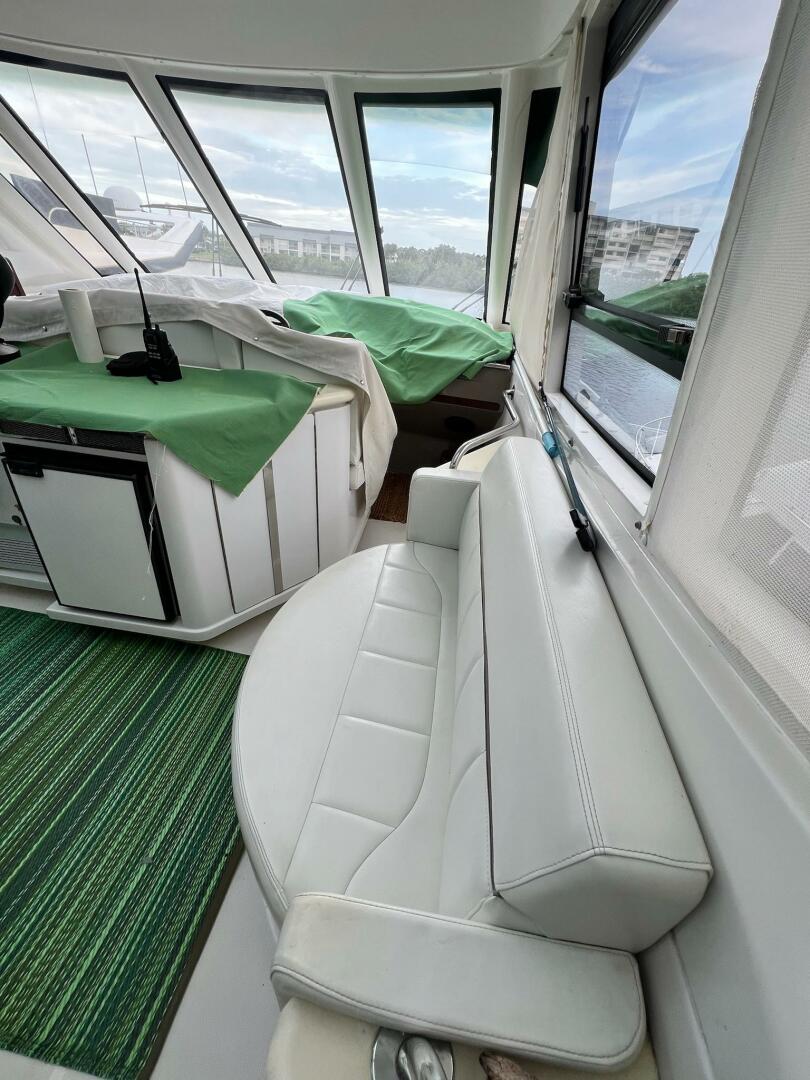 Interior of 2000 Carver 506 Motor Yacht with white seating a