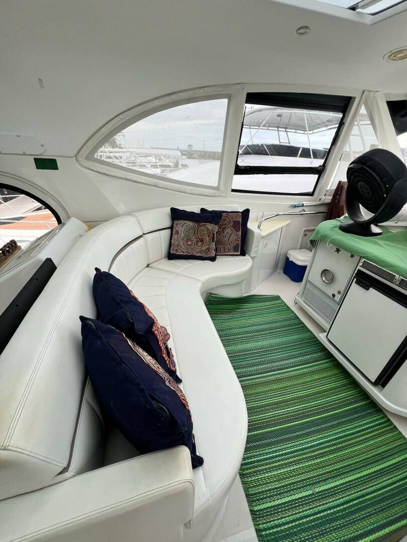 Interior of 2000 Carver 506 Motor Yacht with white seating a