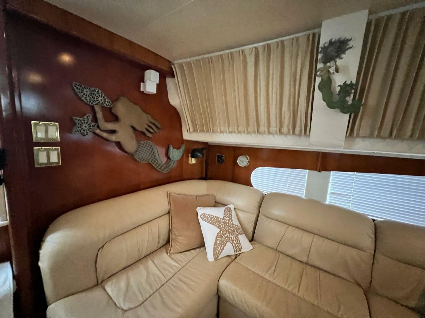 Interior of 2000 Carver 506 Motor Yacht with mermaid decor a