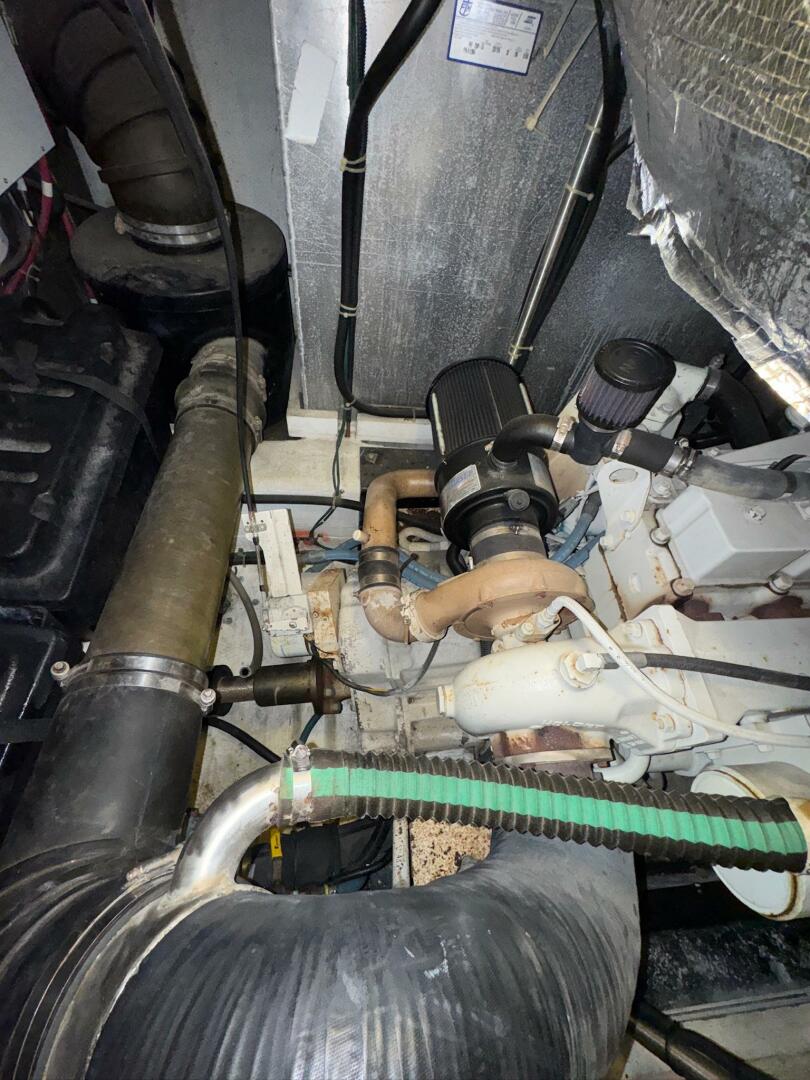 Engine room of a 2000 Carver 506 Motor Yacht, showcasing mec