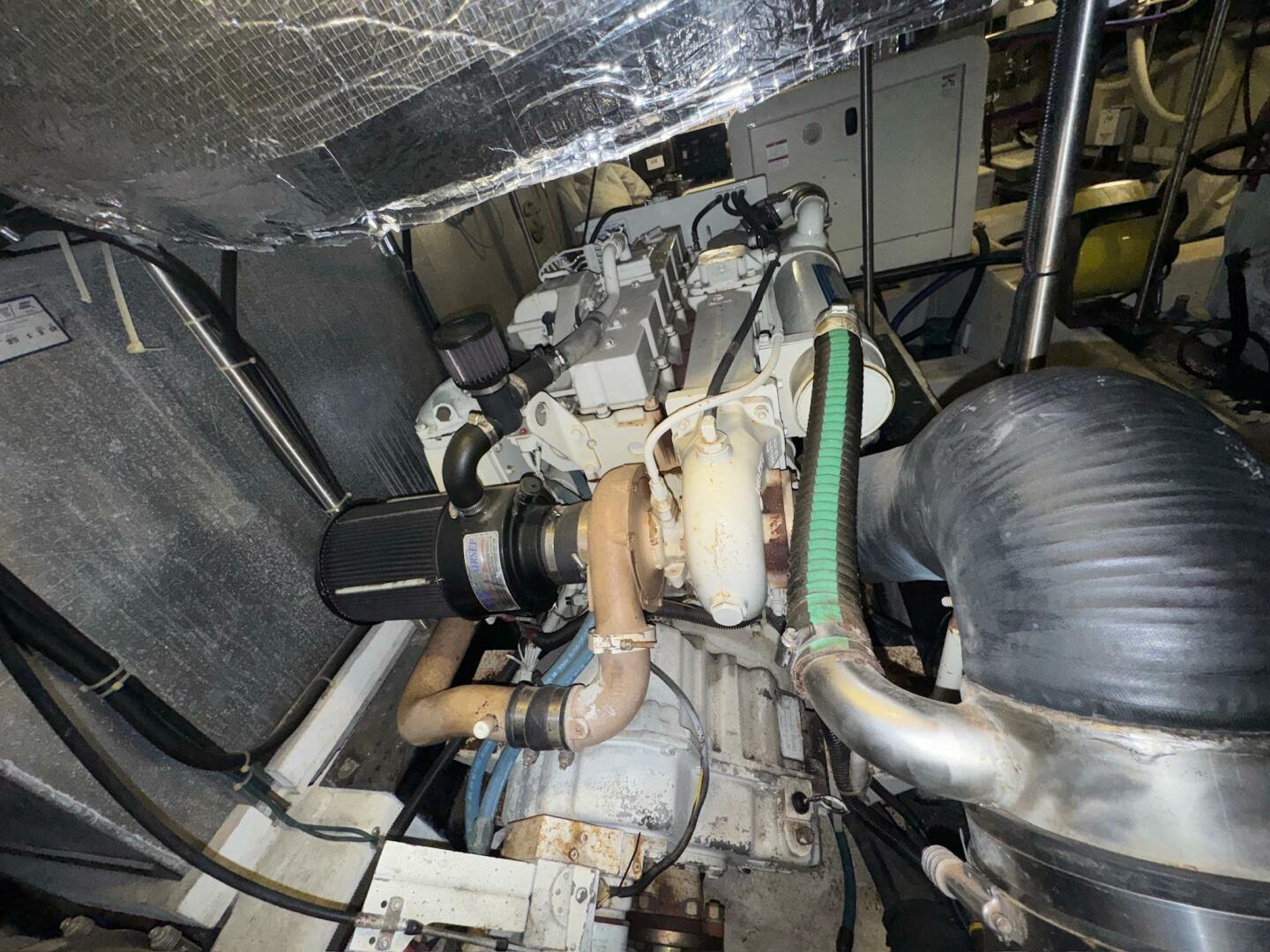 Engine room of 2000 Carver 506 Motor Yacht, showcasing mecha