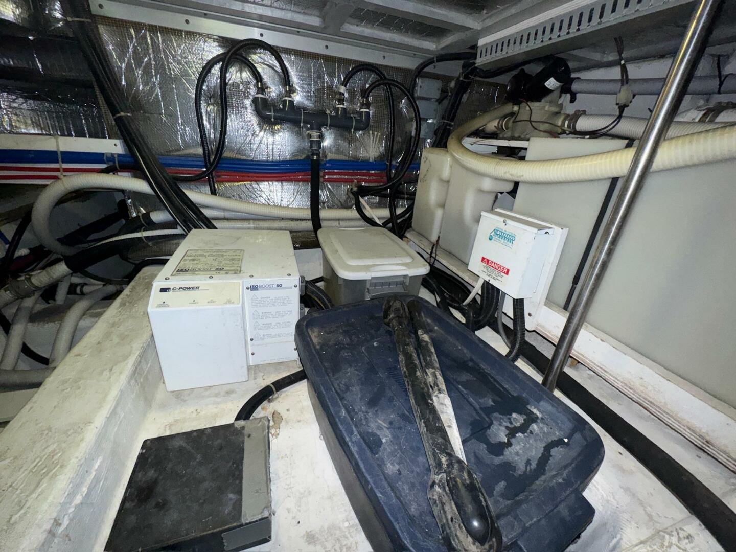 Engine room of 2000 Carver 506 Motor Yacht with various equi