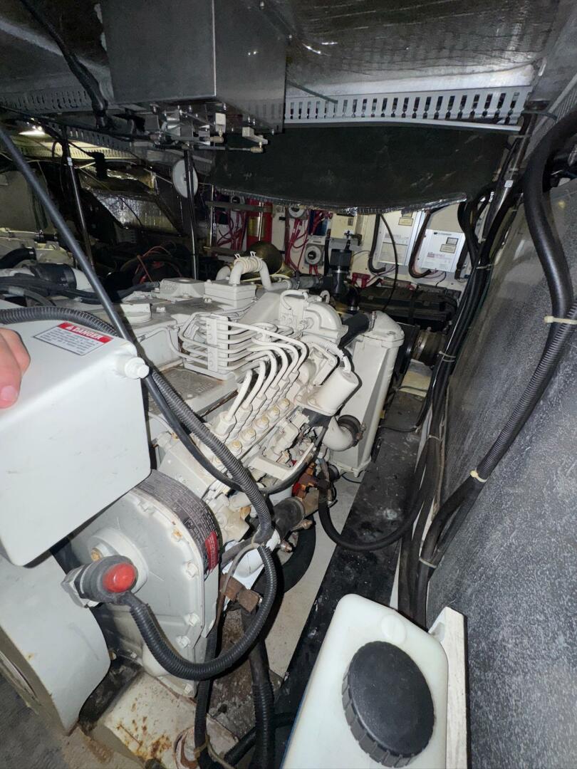 Engine room of a 2000 Carver 506 Motor Yacht, showcasing mec