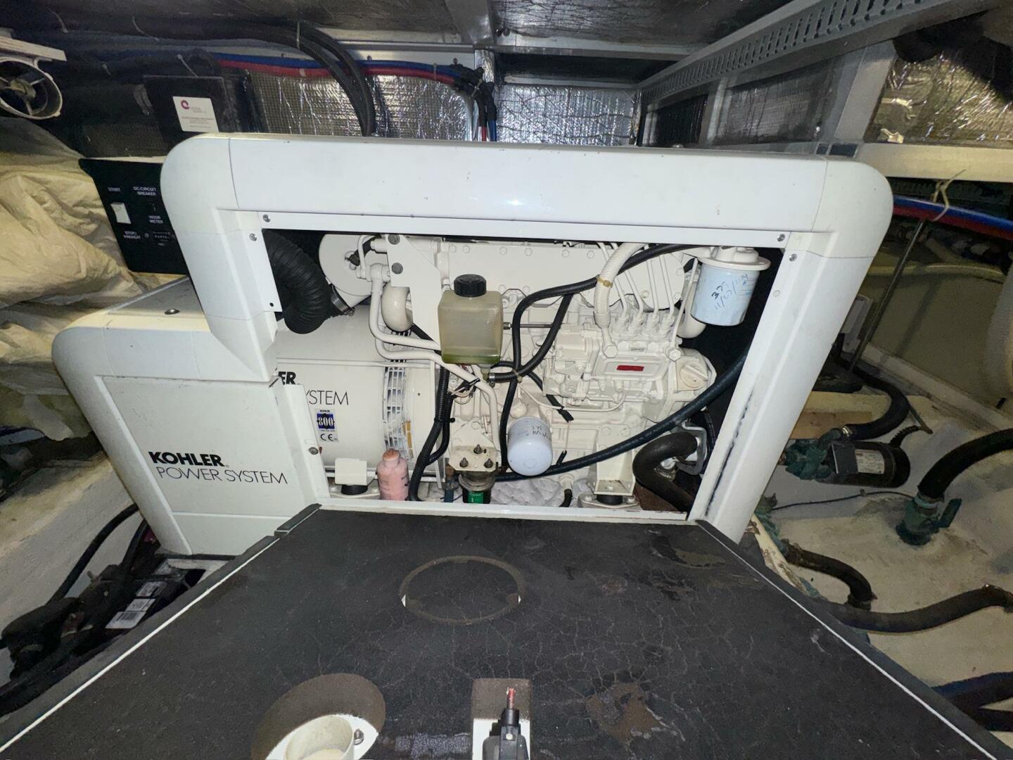Engine room of 2000 Carver 506 Motor Yacht with Kohler power