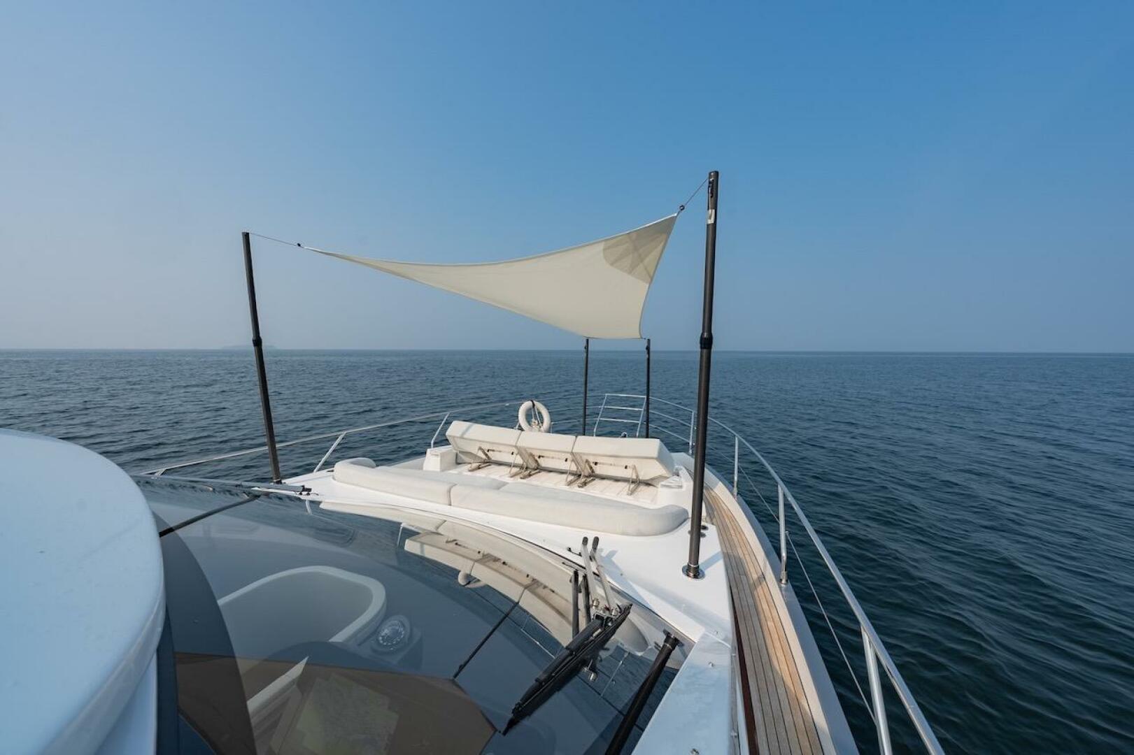 2023 Azimut Fly 53 yacht with sunshade, cruising on open sea
