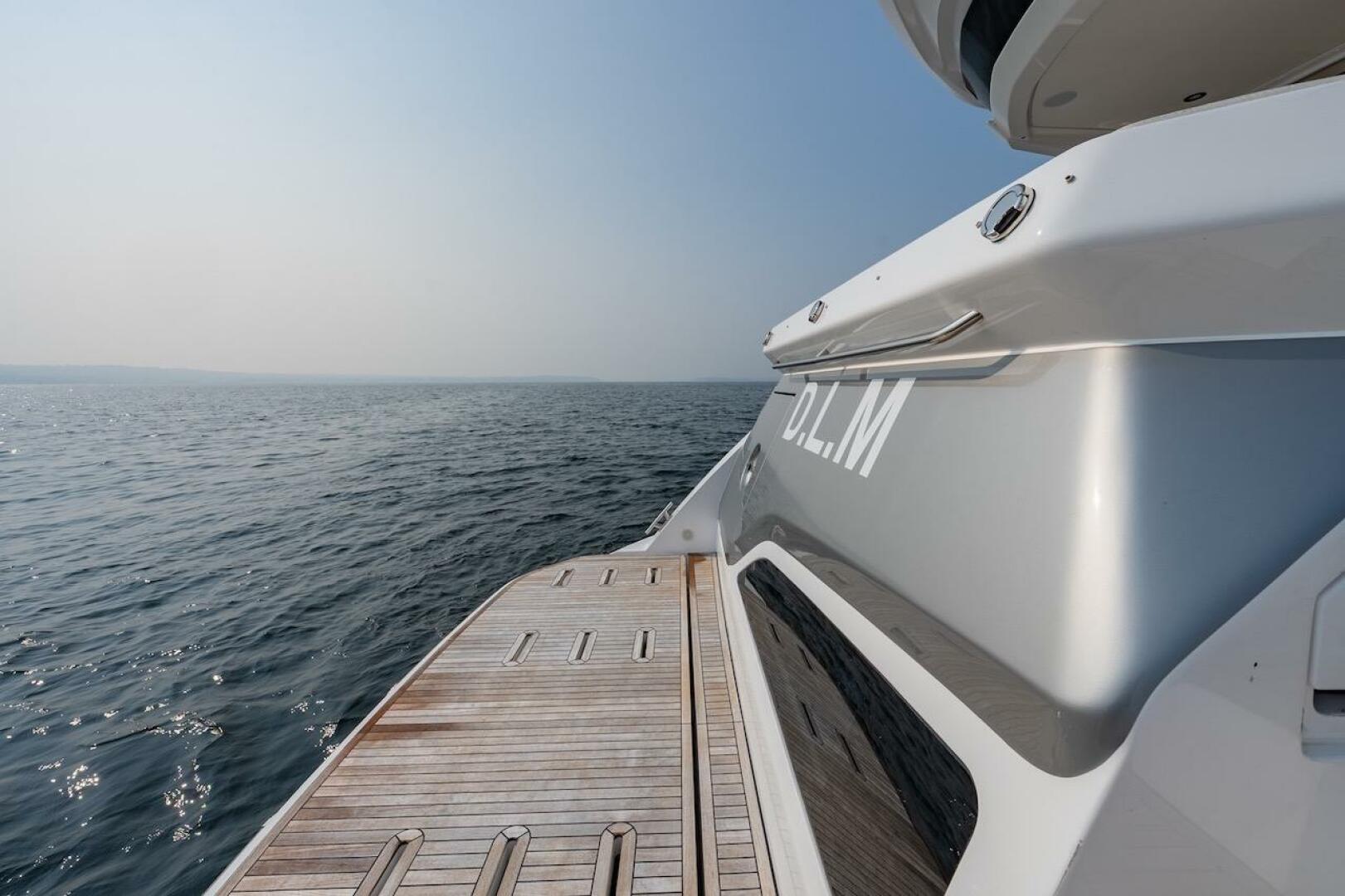 Azimut Fly 53 yacht, 2023 model, with wooden deck overlookin