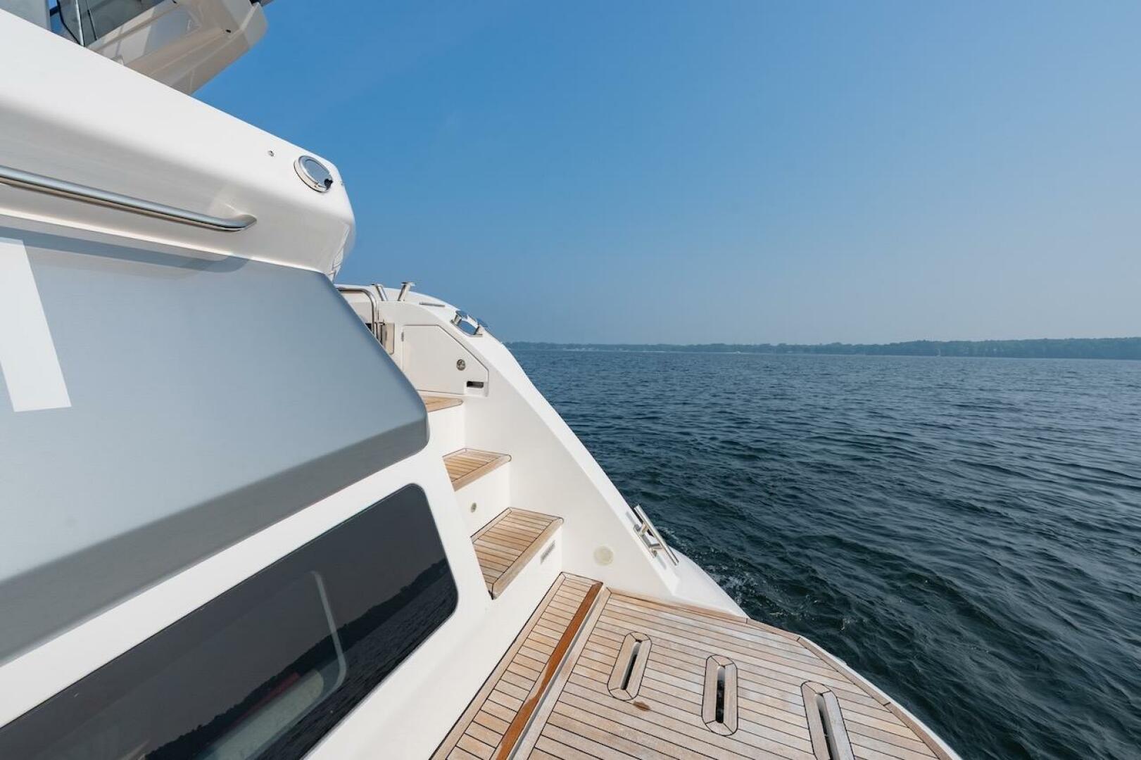 2023 Azimut Fly 53 yacht deck with ocean view under clear bl