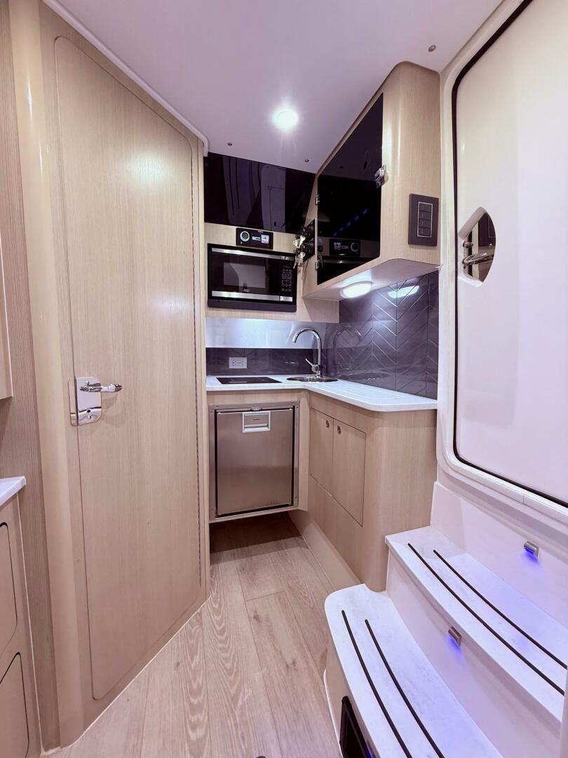 2024 Scout 400 LXF interior kitchen with modern appliances a