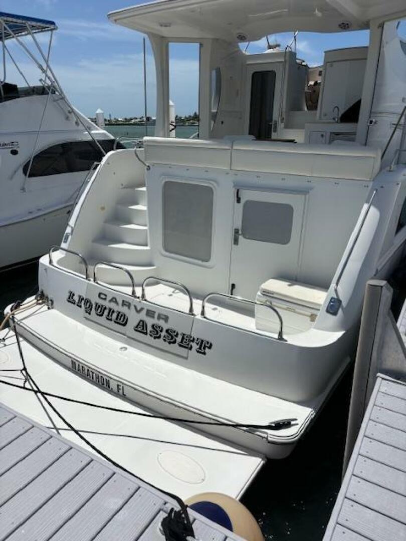 2006 Carver 43 Motor Yacht docked, rear view, named 