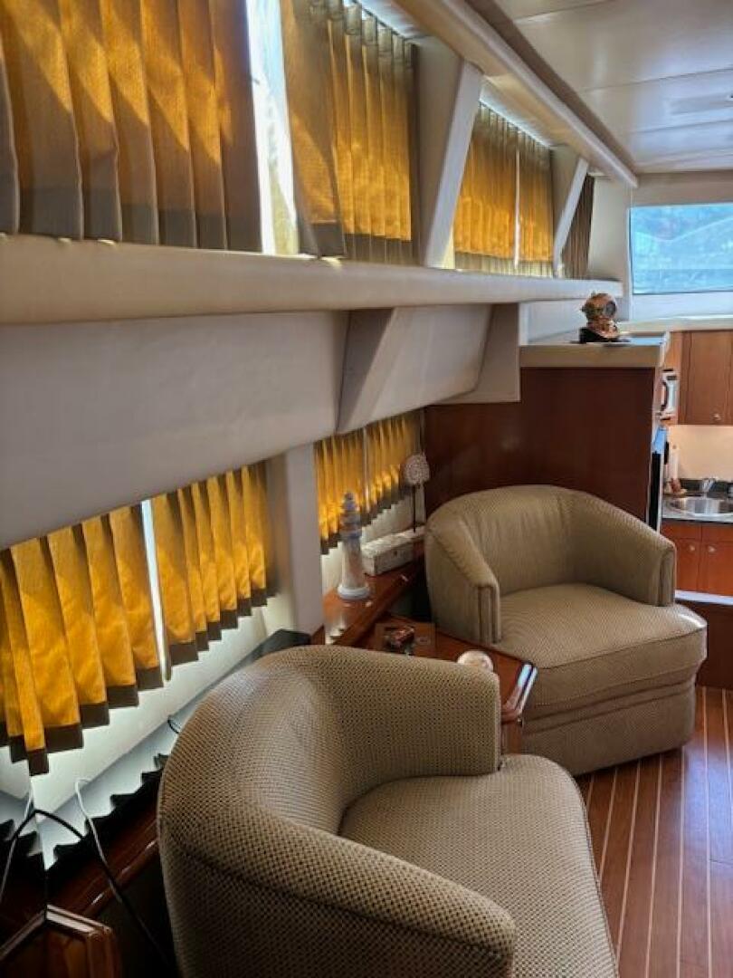 Interior of 2006 Carver 43 Motor Yacht with cozy seating and