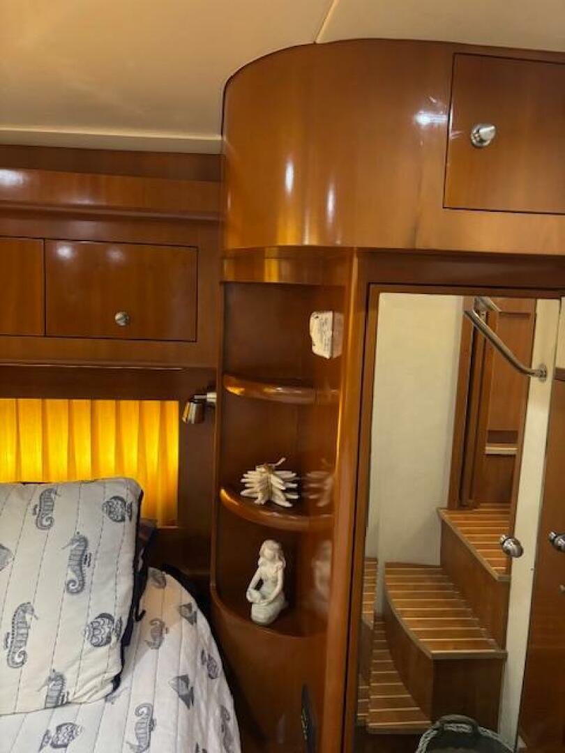 Luxurious 2006 Carver 43 Motor Yacht interior with wooden ca