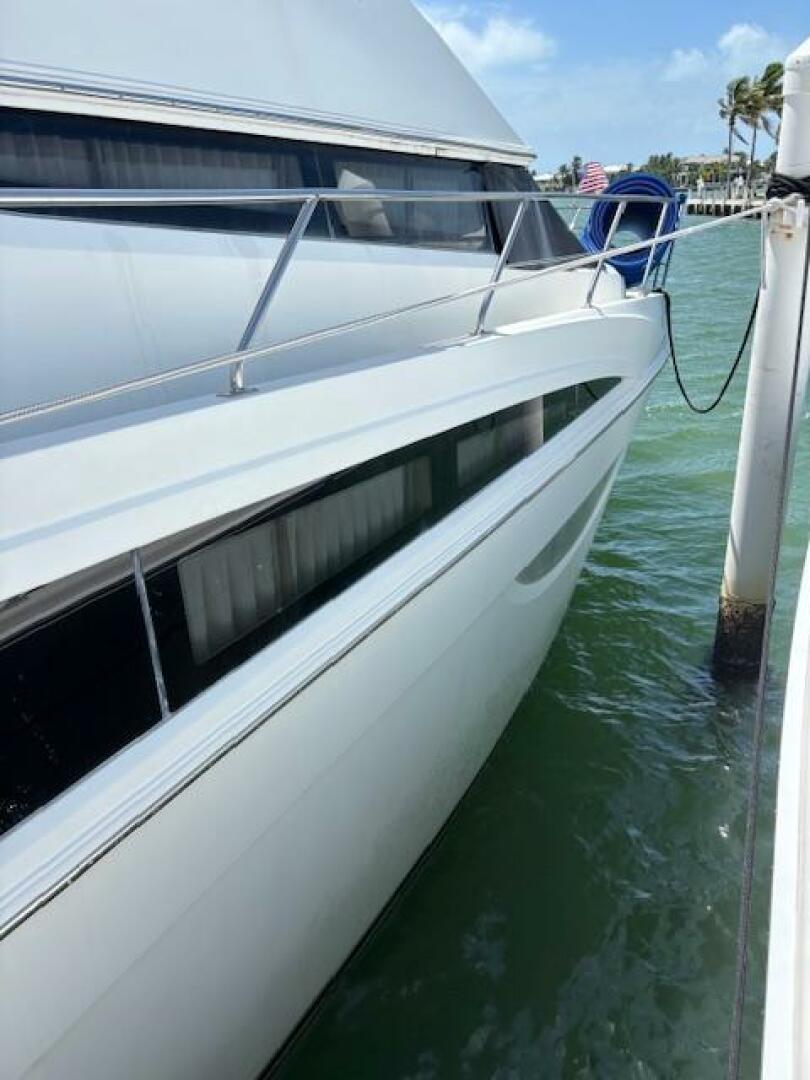 2006 Carver 43 Motor Yacht docked in sunny marina, side view