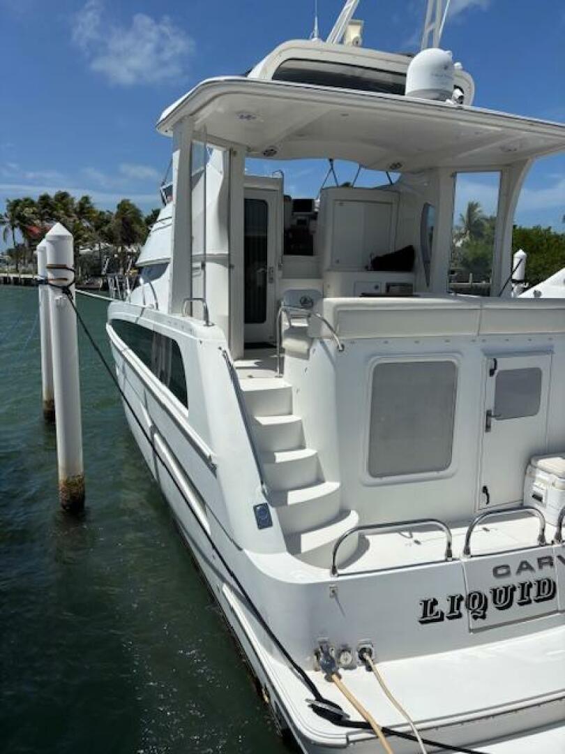 2006 Carver 43 Motor Yacht docked, featuring spacious deck a