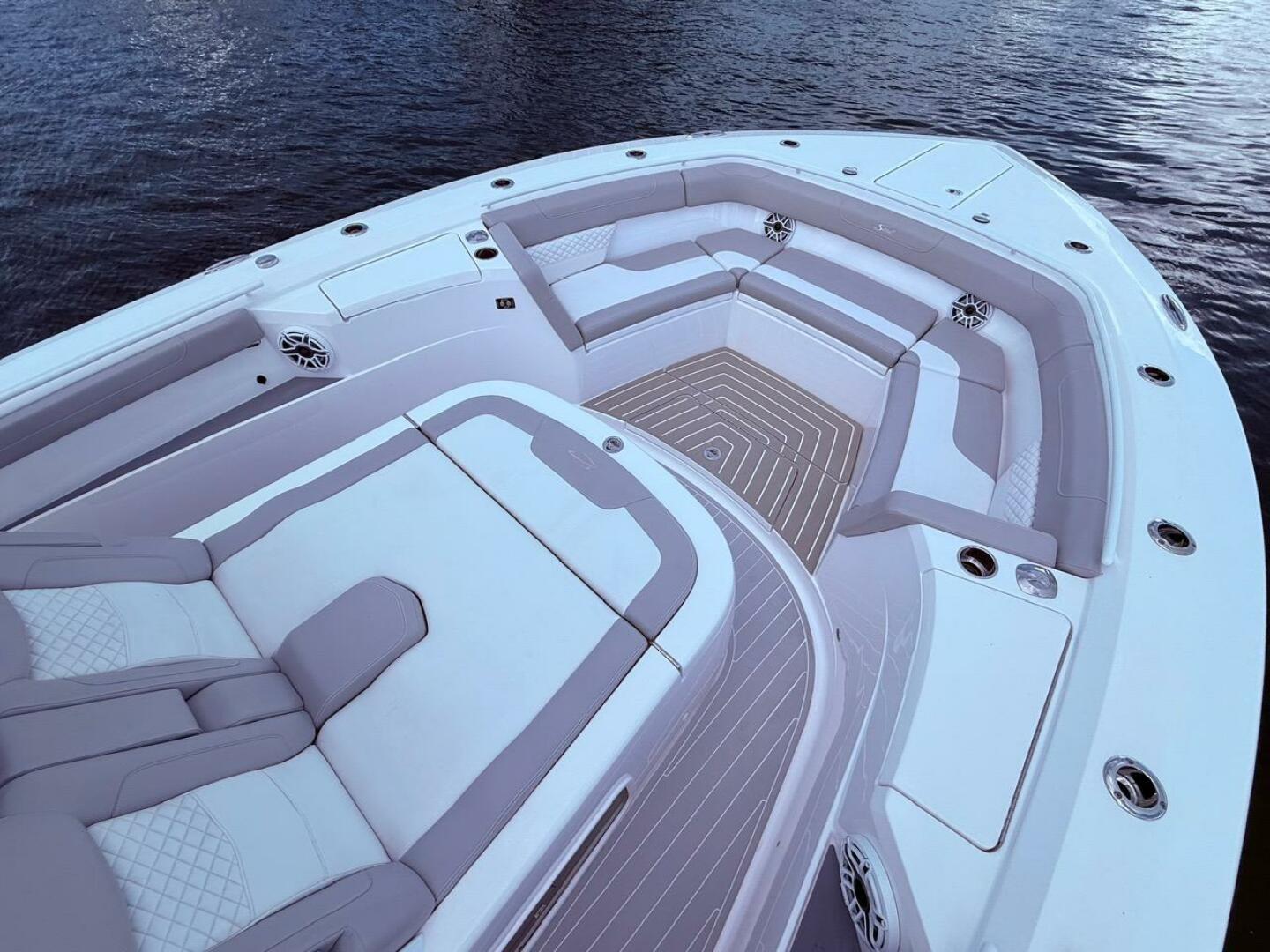 Luxurious seating area on 2024 Scout 400 LXF boat, featuring