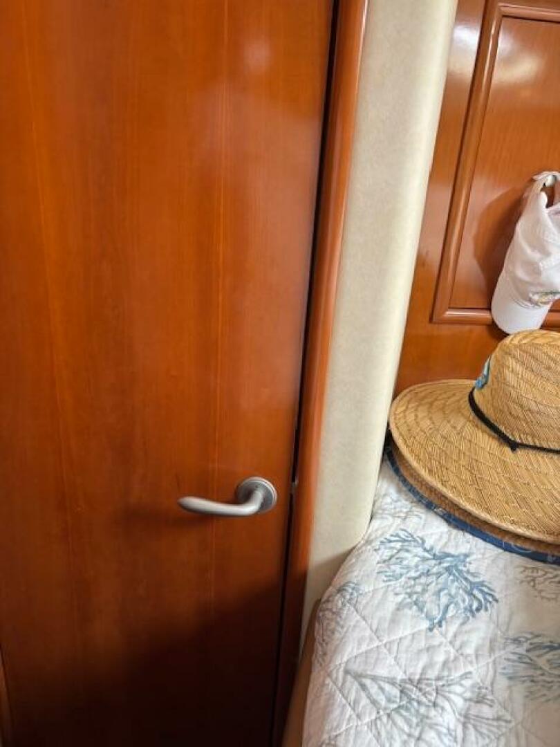 Interior of 2006 Carver 43 Motor Yacht with wooden door and 