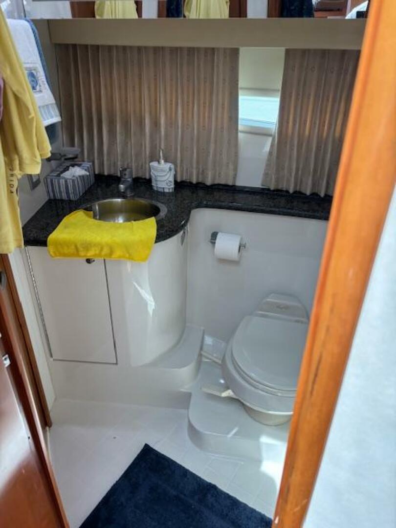 Bathroom interior of 2006 Carver 43 Motor Yacht with sink, t