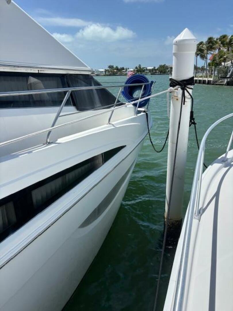 2006 Carver 43 Motor Yacht docked, sunny day, calm waters, b