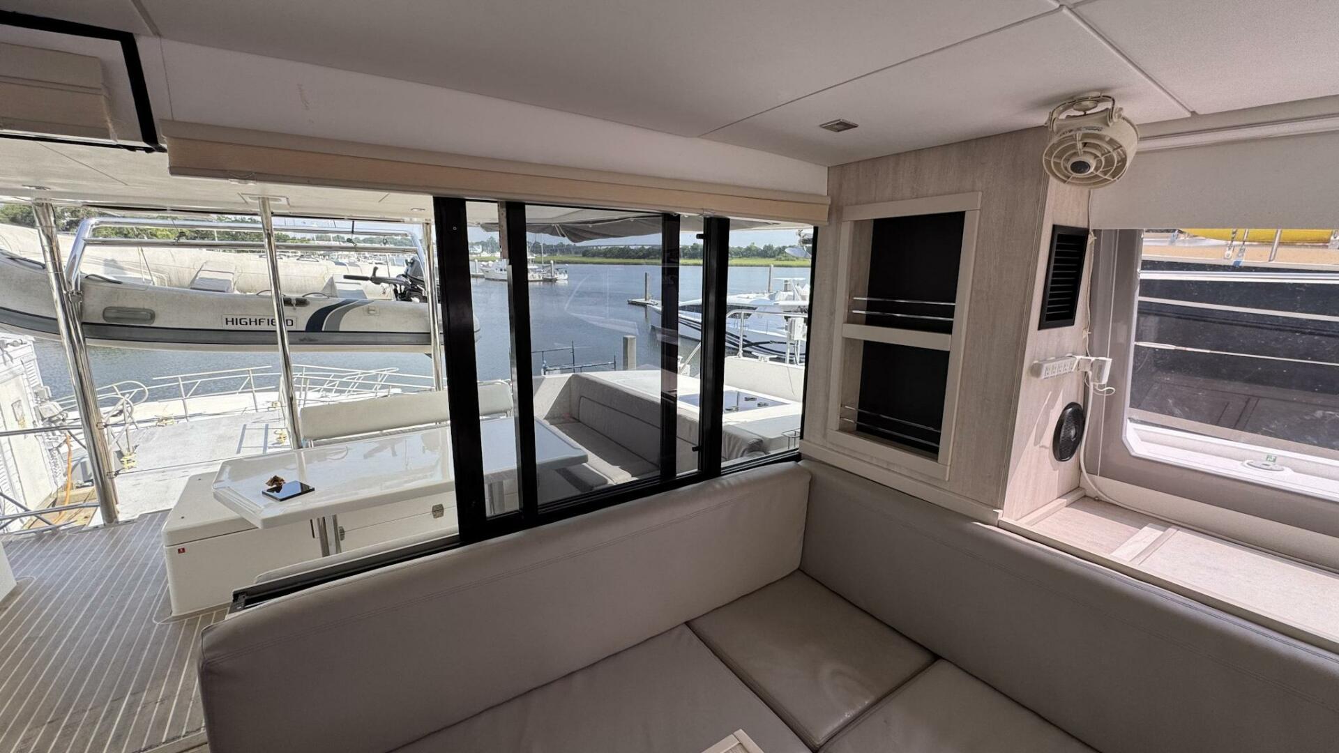 2018 Leopard Power Cat Dinette Storage facing aft