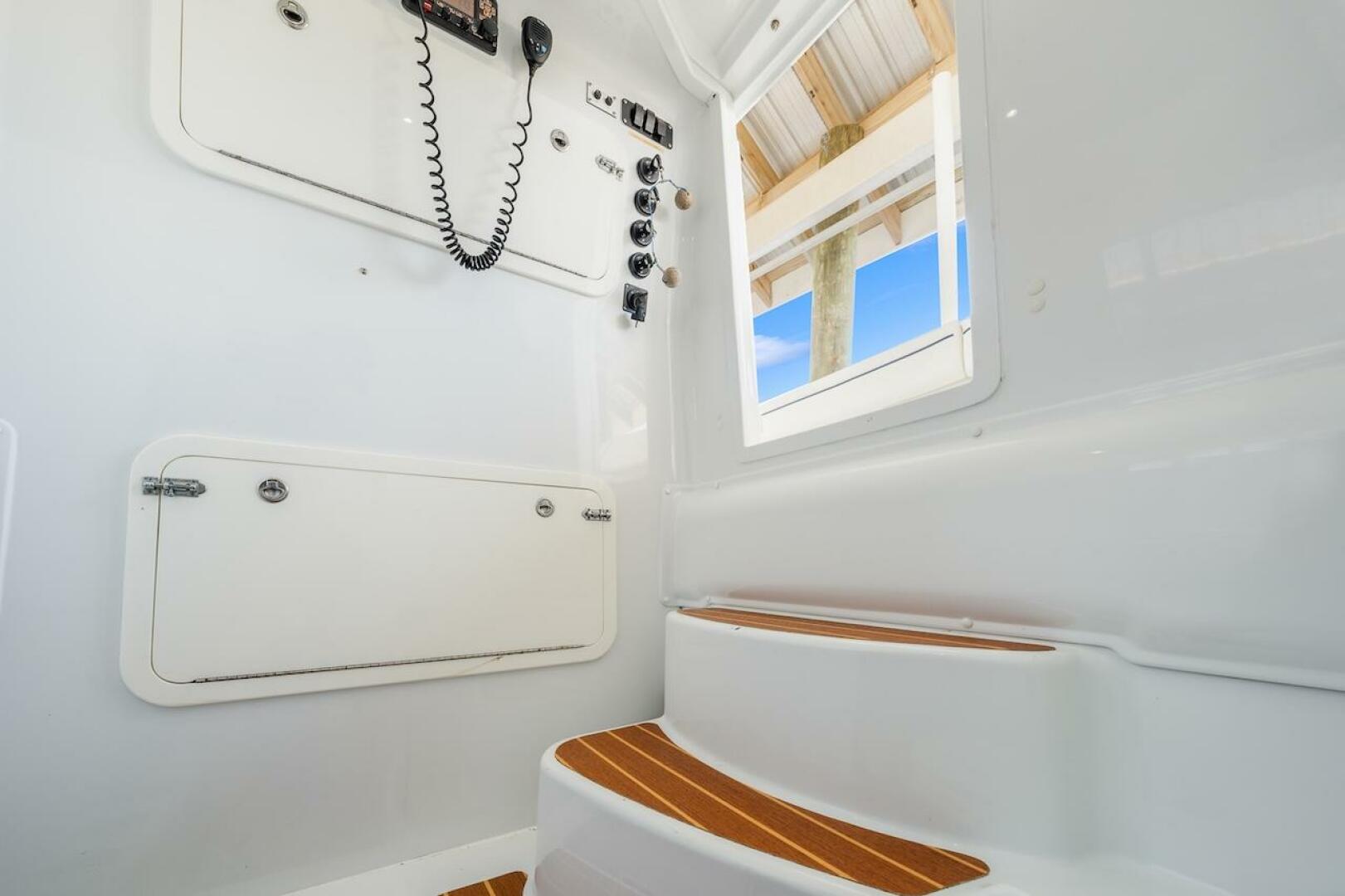 Interior of 2015 Yellowfin 39 boat with steps and control pa