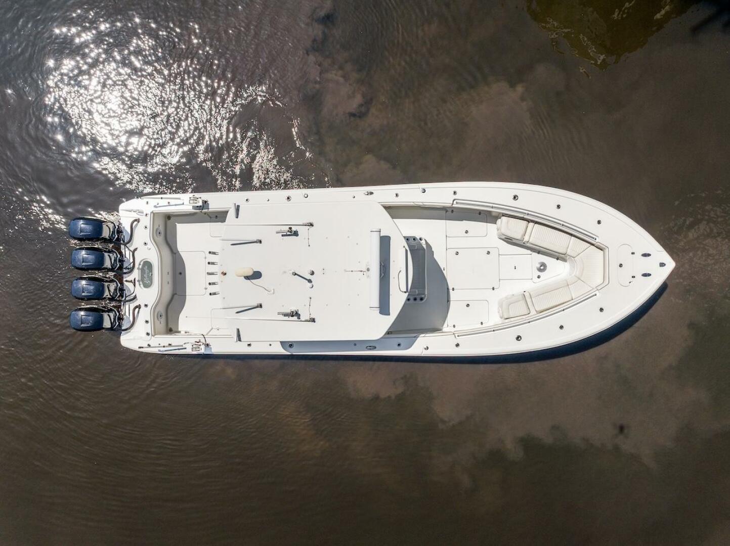 Aerial view of 2015 Yellowfin 39 boat with triple engines on