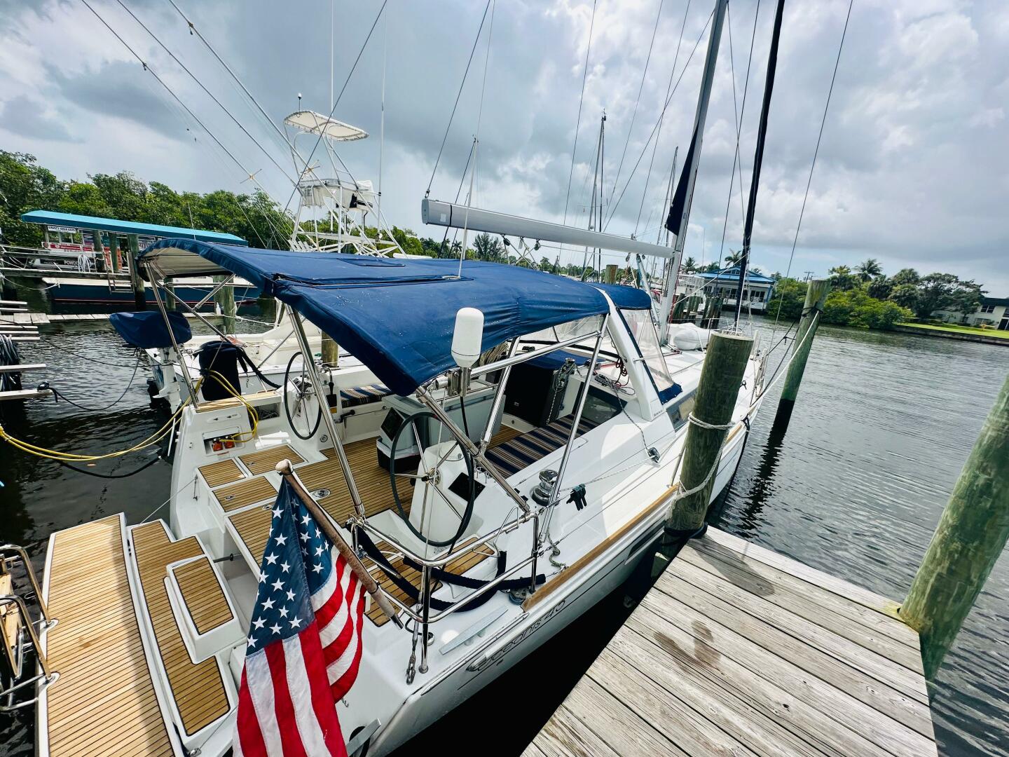 2015 Beneteau Oceanis 45 sailboat docked, featuring blue can