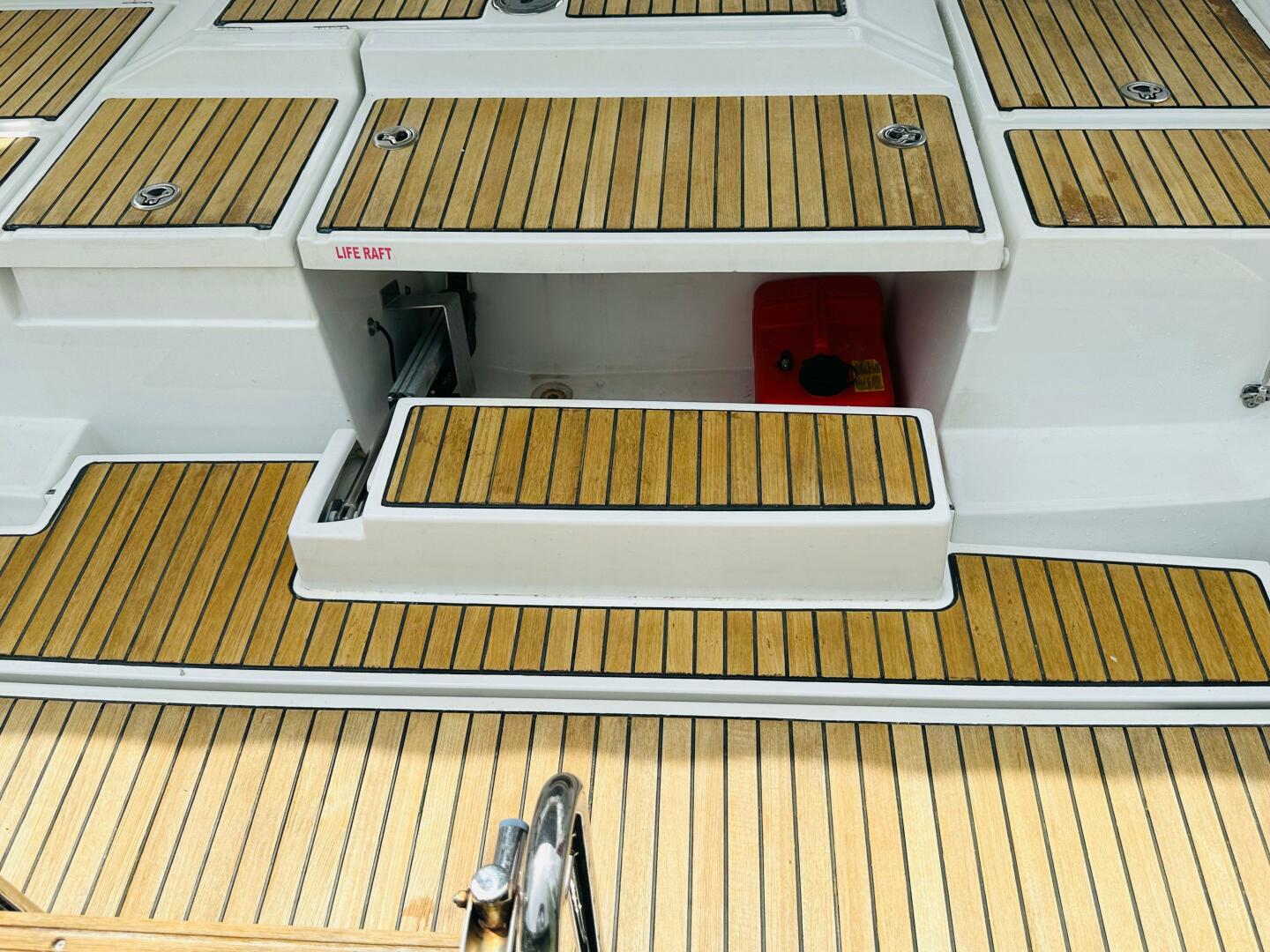 Teak deck of 2015 Beneteau Oceanis 45 sailboat with life raf