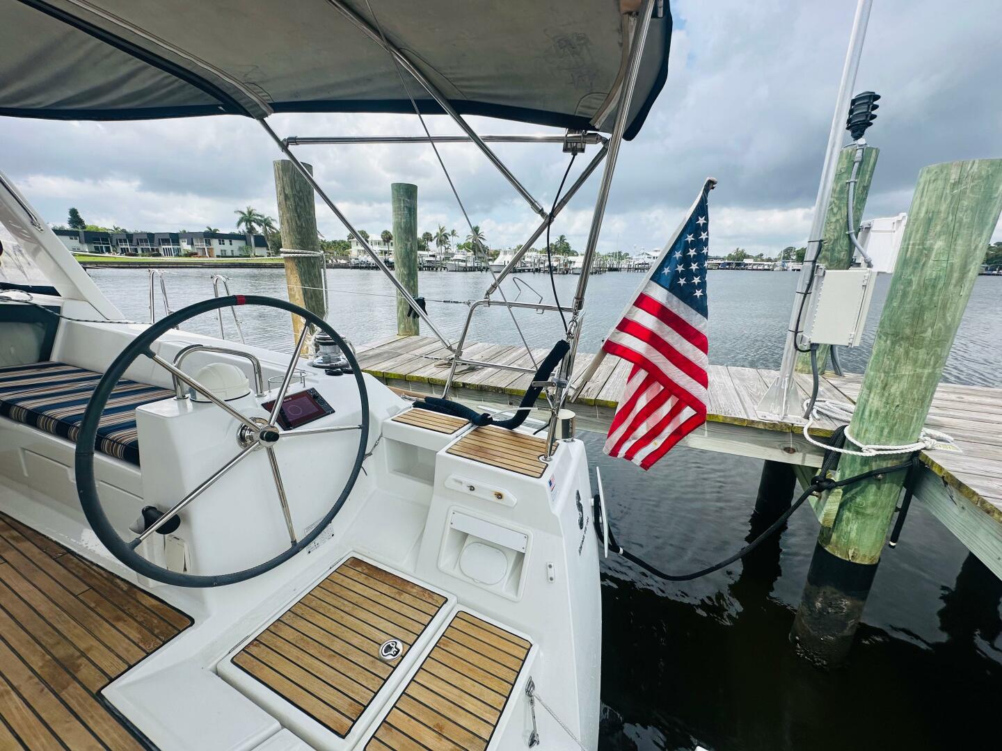 Beneteau Oceanis 45 sailboat cockpit with American flag, doc