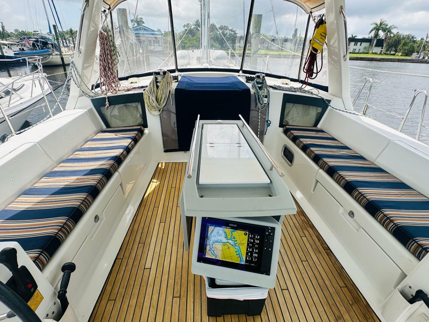 2015 Beneteau Oceanis 45 yacht cockpit with striped seating 