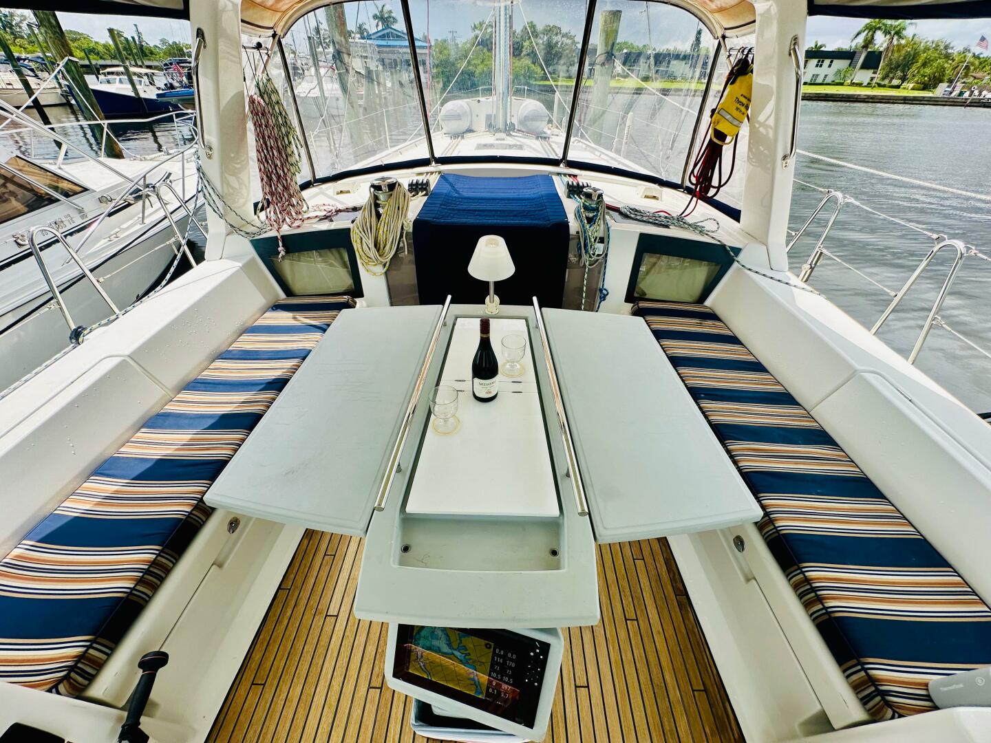 Cockpit of 2015 Beneteau Oceanis 45 with striped seating and