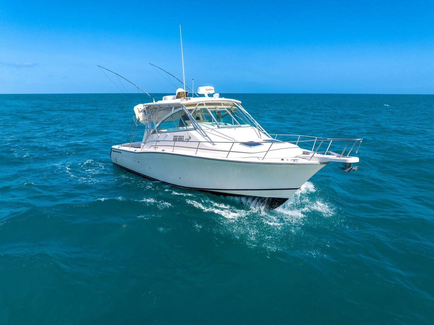 2007 Grady-White Express 360 boat cruising on open blue ocea