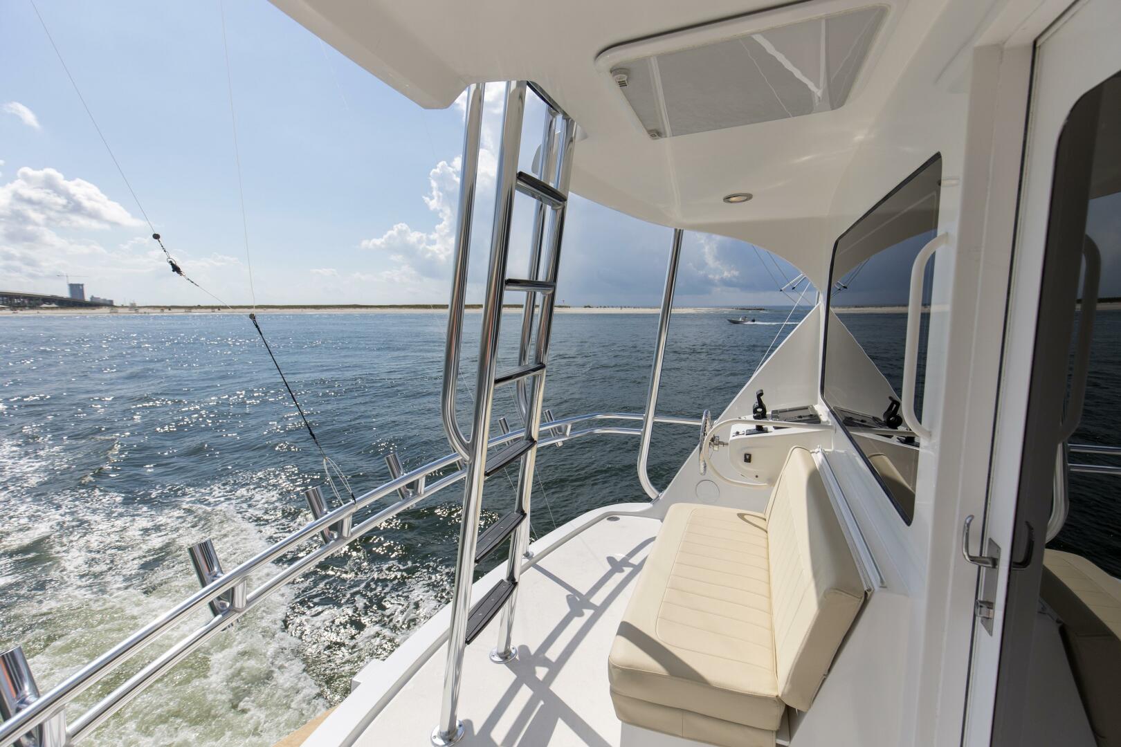 2007 68 Hatteras 68 Enclosed Bridge REFUGE Aft Flybridge Hel