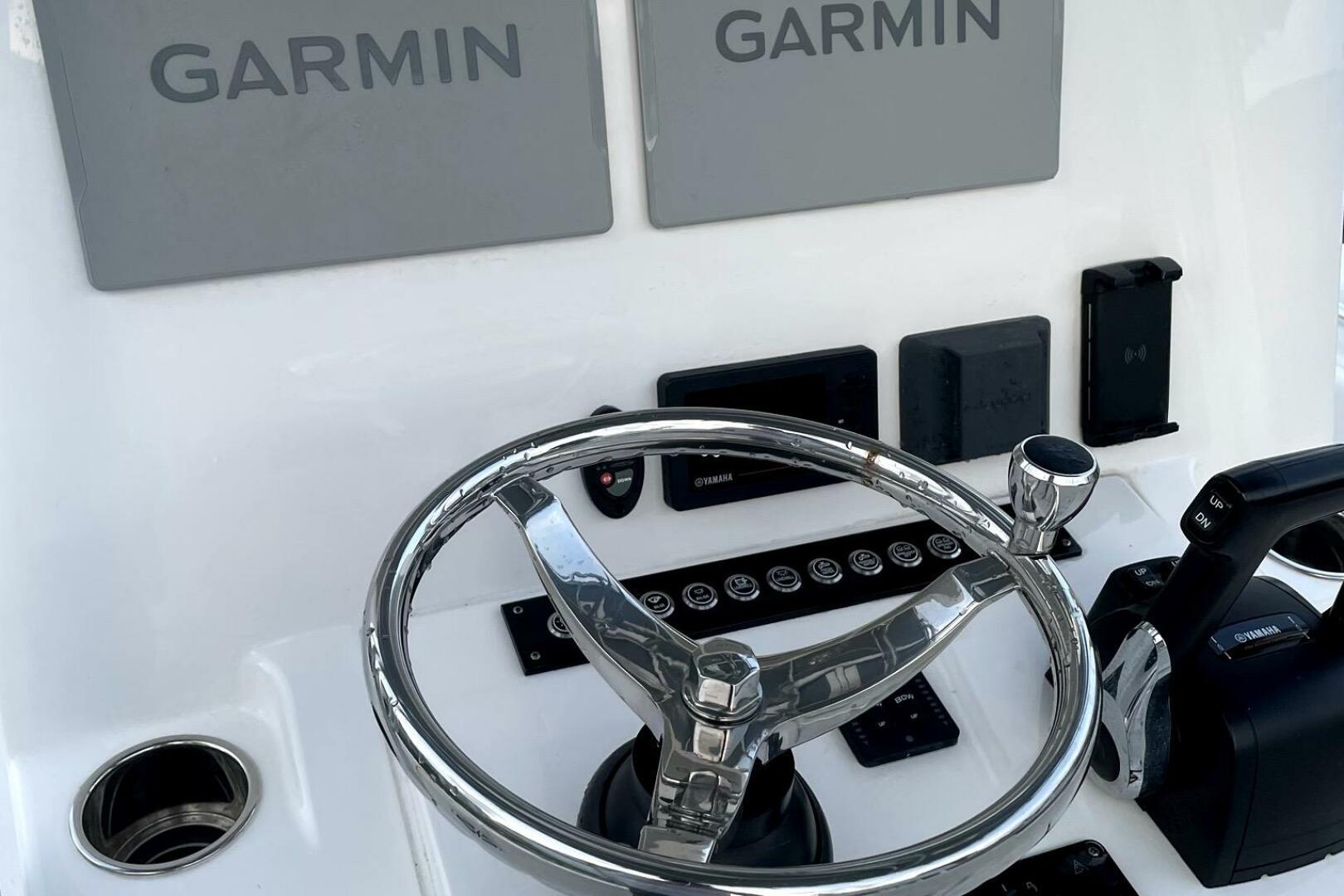 2023 Contender 24 Sport boat dashboard with Garmin displays 