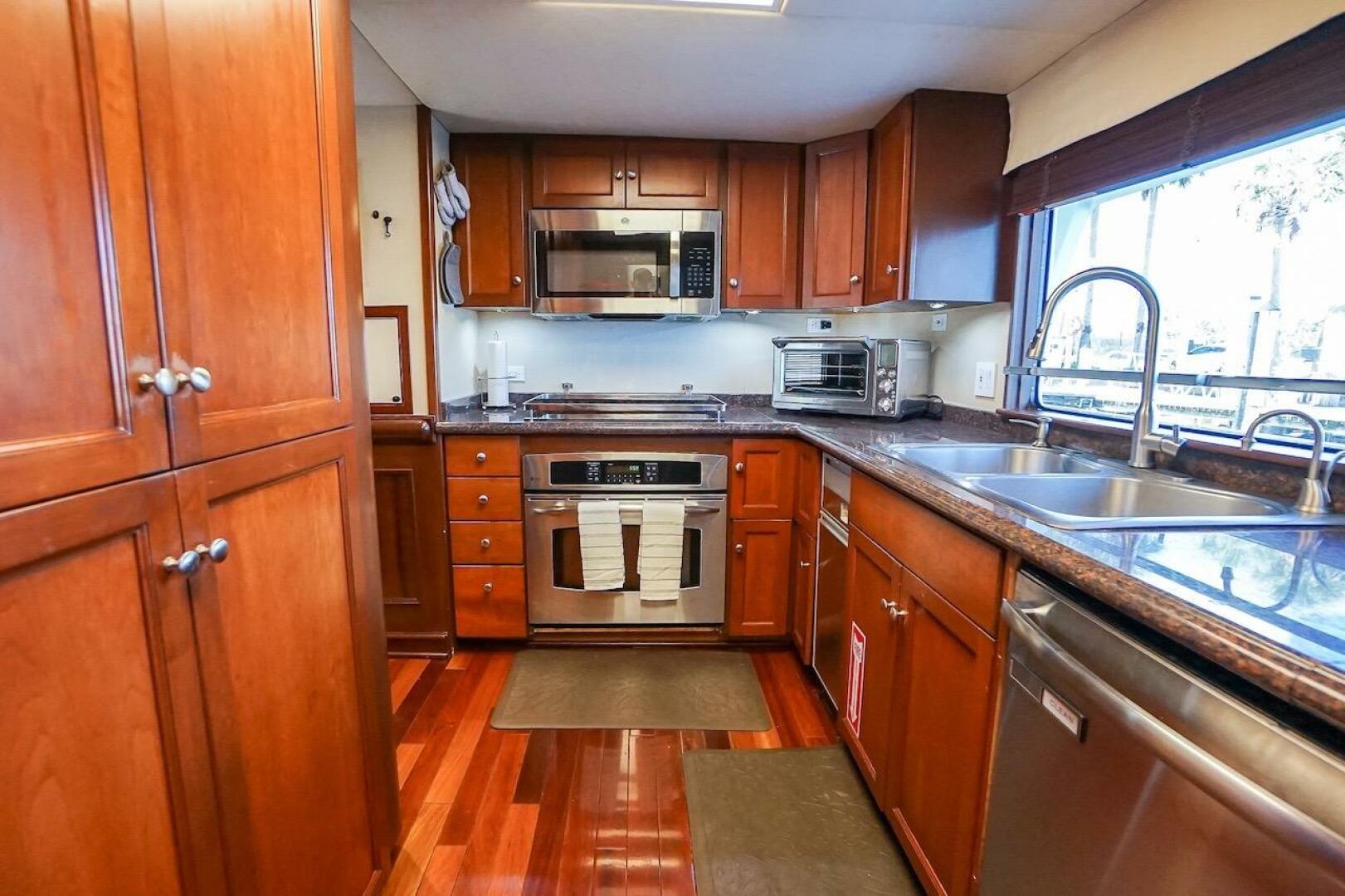 Luxurious kitchen in 1996 ABD 90 Explorer yacht with wooden 