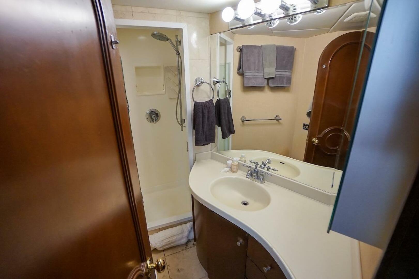 Compact bathroom in 1996 ABD 90 Explorer with shower, sink, 