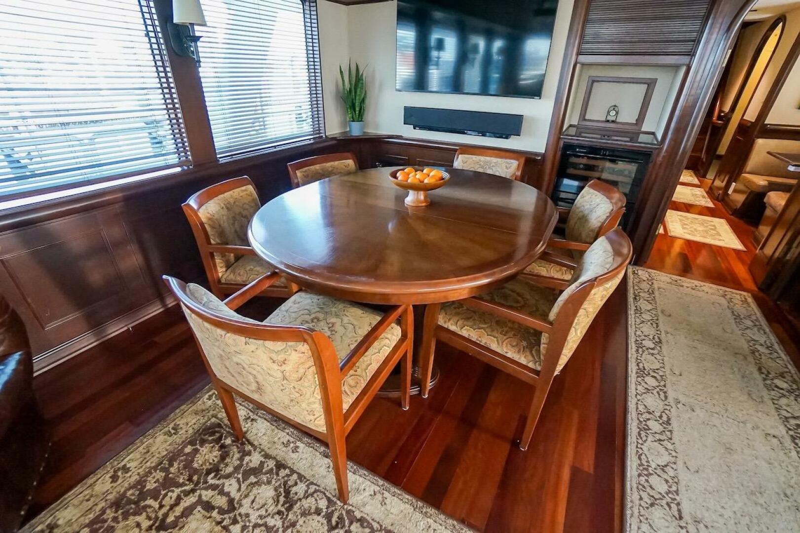 Luxurious dining area in 1996 ABD 90 Explorer yacht with ele
