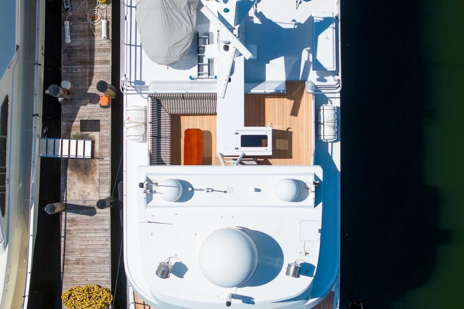 Aerial view of 1996 ABD 90 Explorer yacht docked at a marina