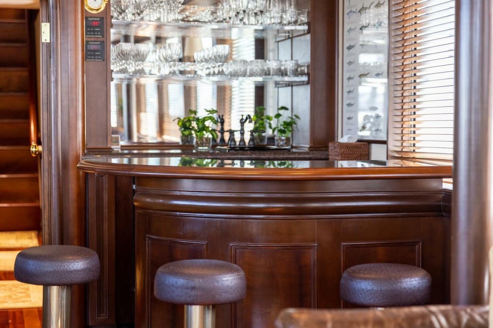 Luxurious dining area in 1996 ABD 90 Explorer yacht with TV 