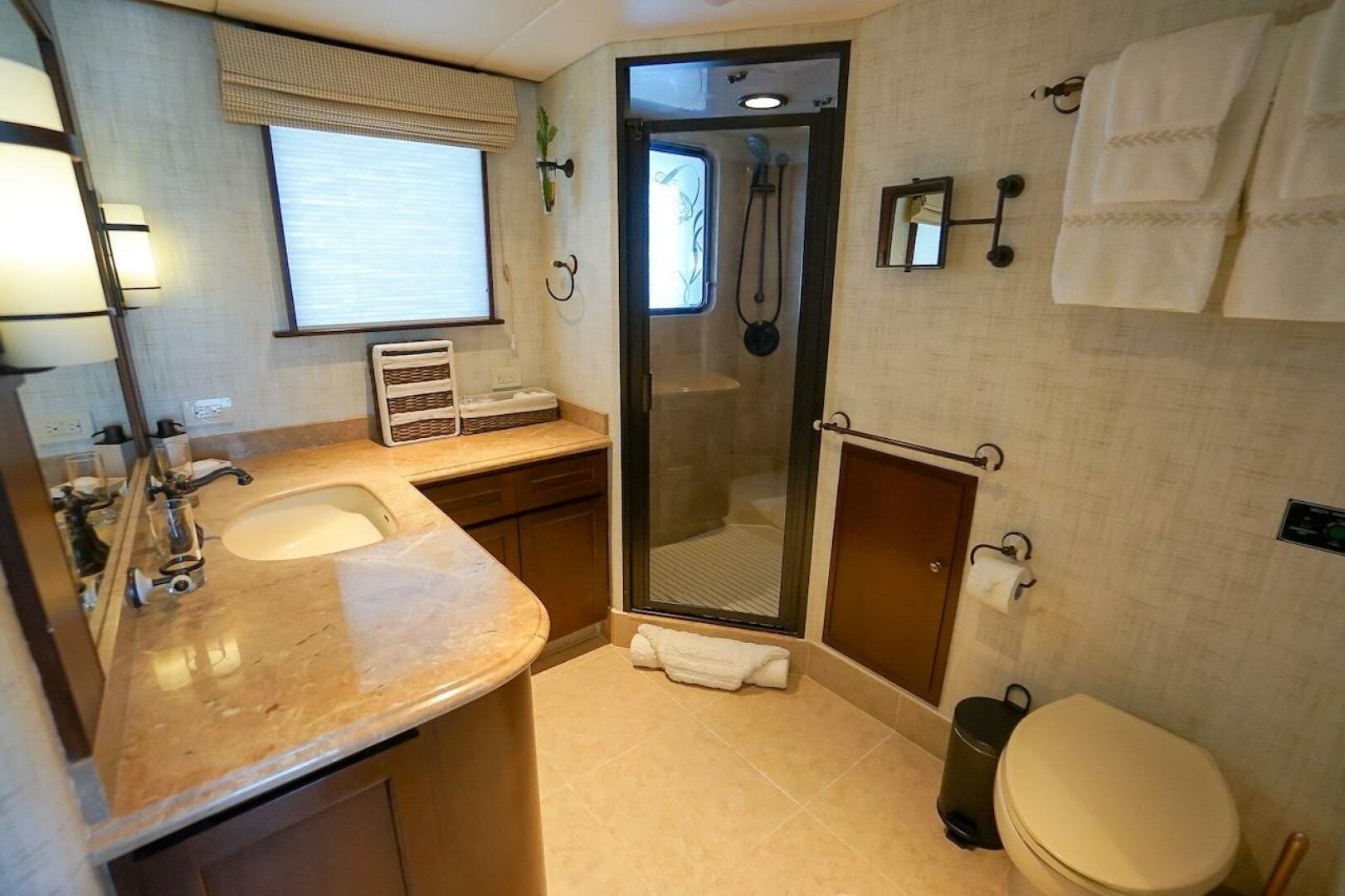 Luxurious 1996 ABD 90 Explorer yacht bathroom with marble co